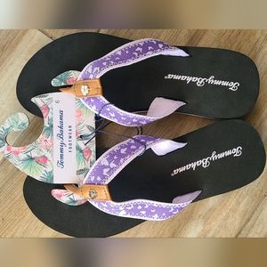 Tommy Bahama Flip Flops with Champaign Hibiscus Accents with Purple Straps. NWT.